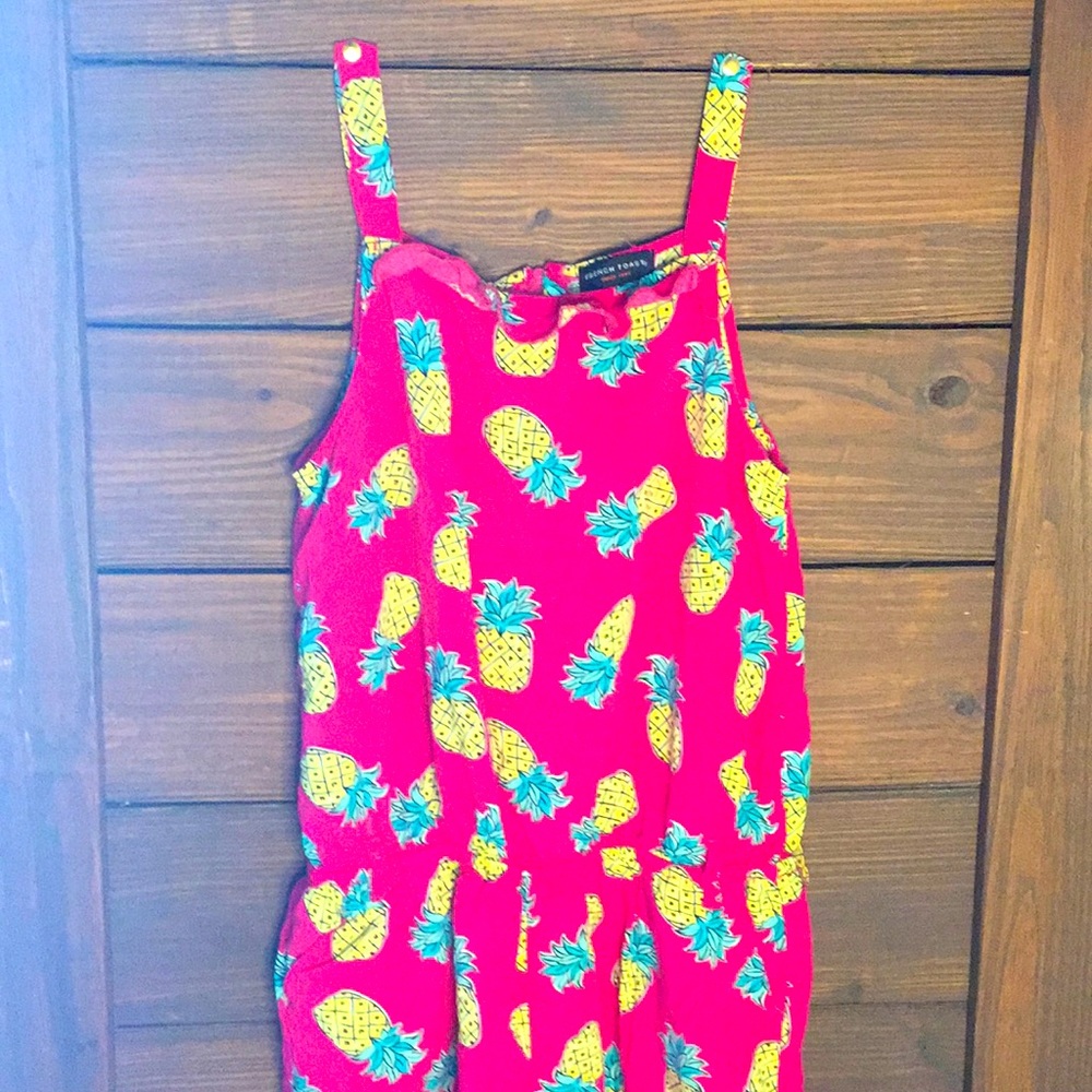 Girls zip up pineapple romper. Size 14/16